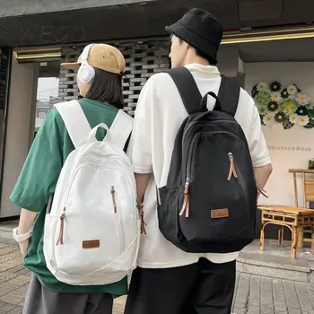 Japonų atsitiktinės studentų kuprinės Vidurinės mokyklos didelės talpos jaunesniųjų vidurinių mokyklų studentų galinė pakuotė