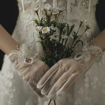 Vestuvinės suknelės pirštinės reiškia naują madingą nuotakos vestuvinę suknelę perlinės pirštinės vasaros moterų aksesuarai